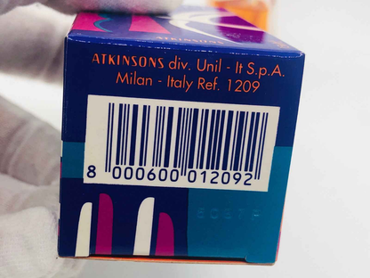 Scatola del profumo vintage Atkinsons Poivre con codice a barre e design colorato elegante