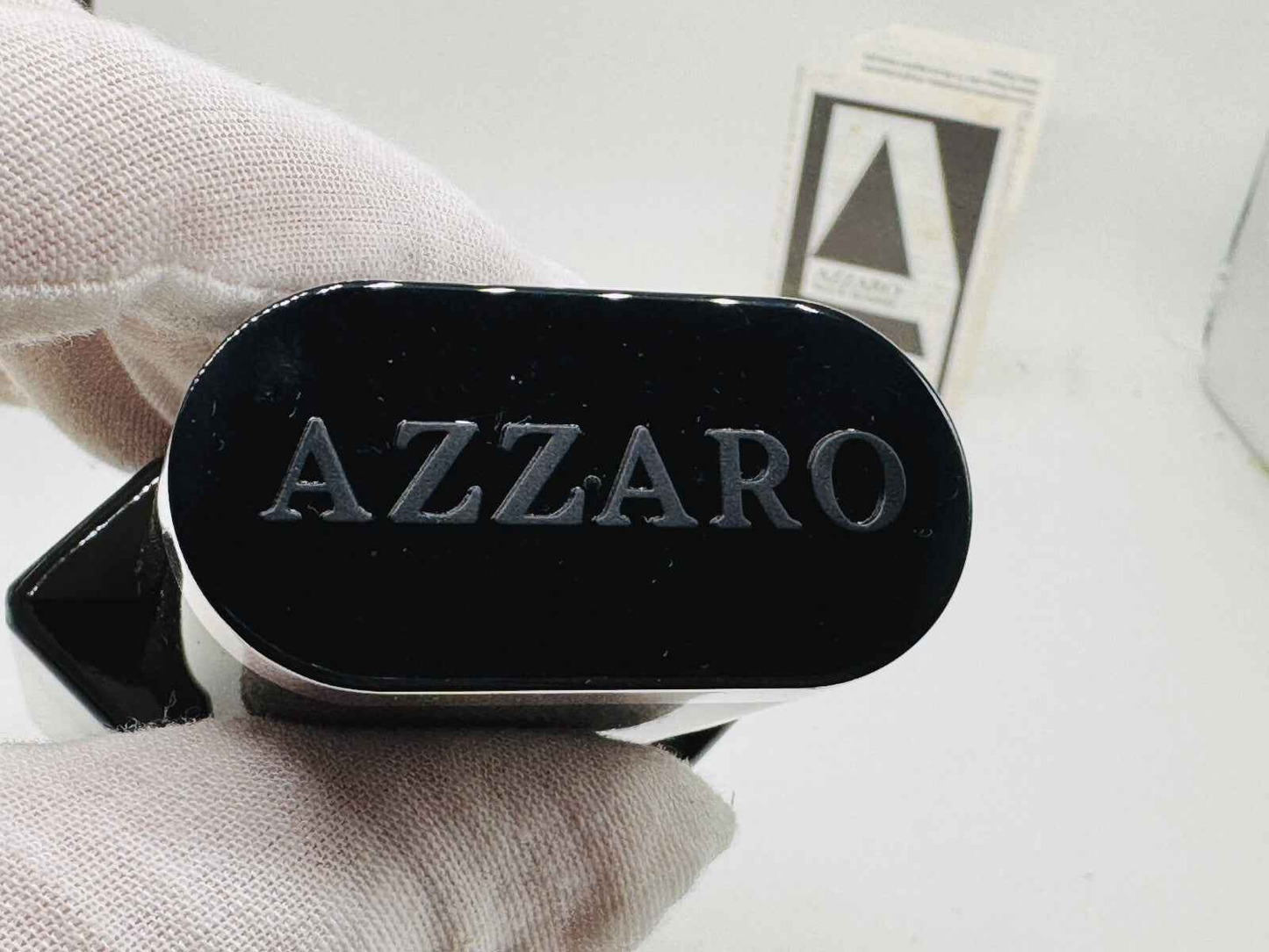 Flacone di profumo Azzaro pour homme vintage con dettagli eleganti e design raffinato