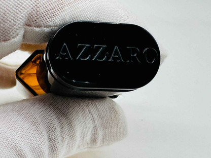 Flacone di Profumo Azzaro Pour Homme Vintage con tappo elegante e design distintivo