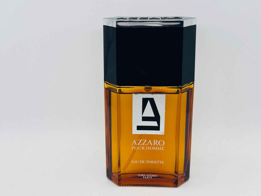 Flacone di profumo Azzaro Uomo Eau de Toilette con elegante design e tonalità dorata