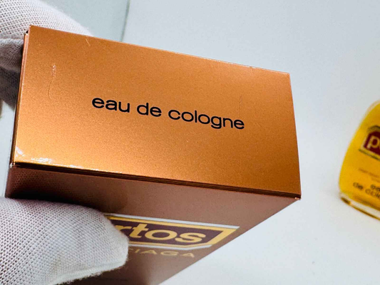 Scatola di eau de cologne Balenciaga Portos Vintage con finitura dorata e logo distintivo