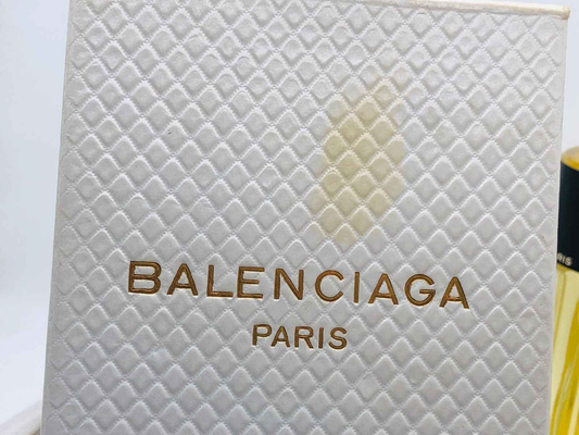 Scatola del profumo Balenciaga Fleeting Moment con design elegante e logo Balenciaga in oro