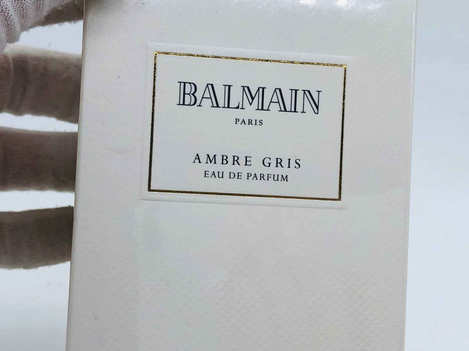 Scatola di profumo Balmain Ambre Gris Vintage con etichetta elegante e dettagli raffinati