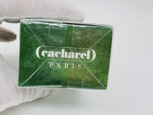 Scatola di profumo Eden Cacharel Vintage con design verde elegante e logo distintivo di Cacharel