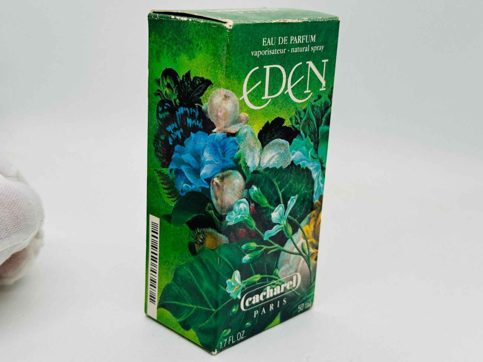Scatola di profumo Eden Cacharel Vintage con illustrazioni floreali e dettagli naturali