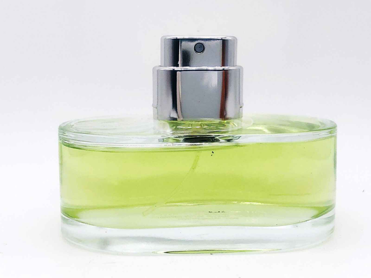 Profumo Must Pour Homme Cartier Vintage in bottiglia trasparente con spruzzatore, aroma fresco e sofisticato
