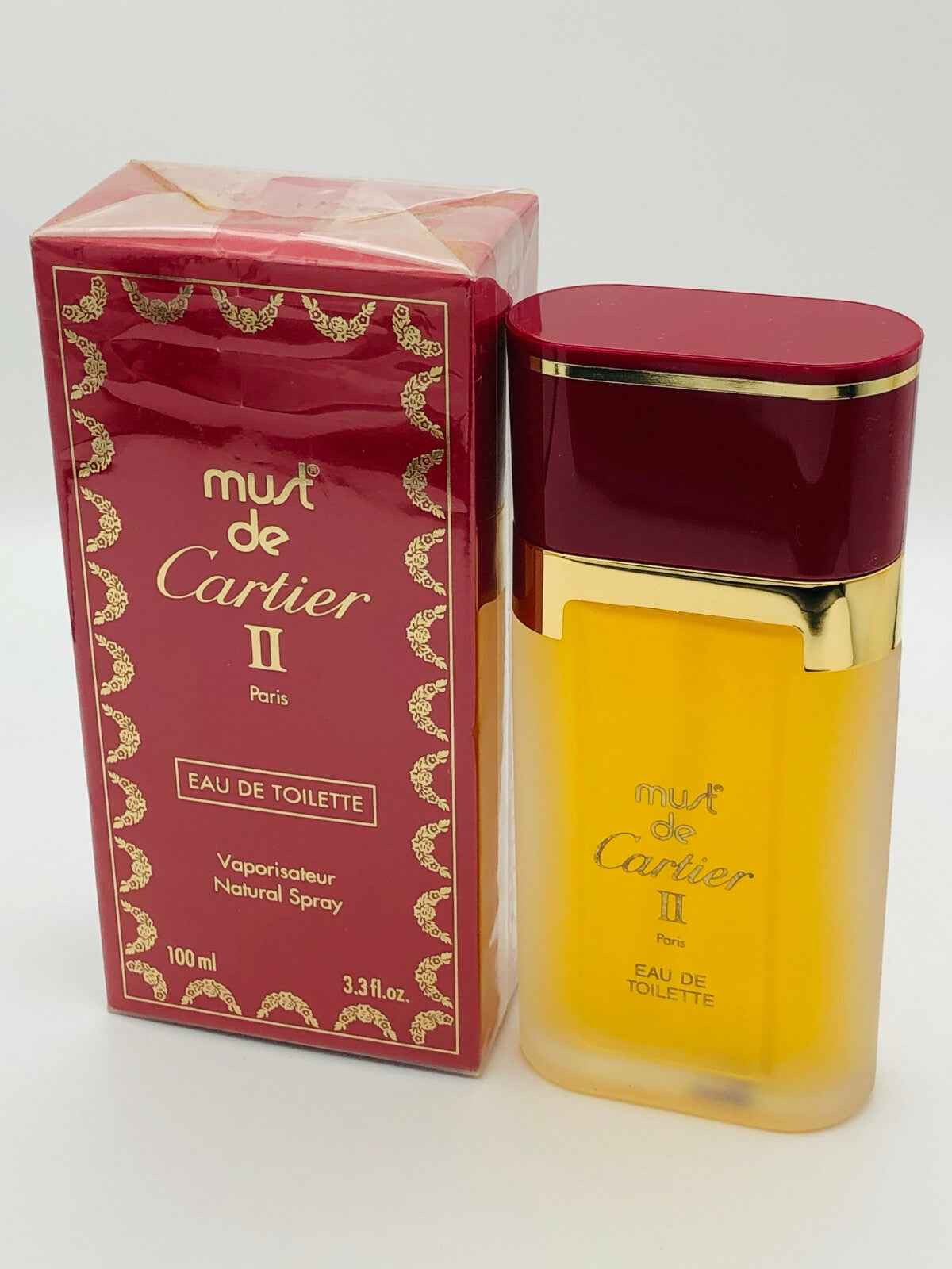 Profumo Must De Cartier in flacone da 100 ml con scatola elegante per un tocco di classe