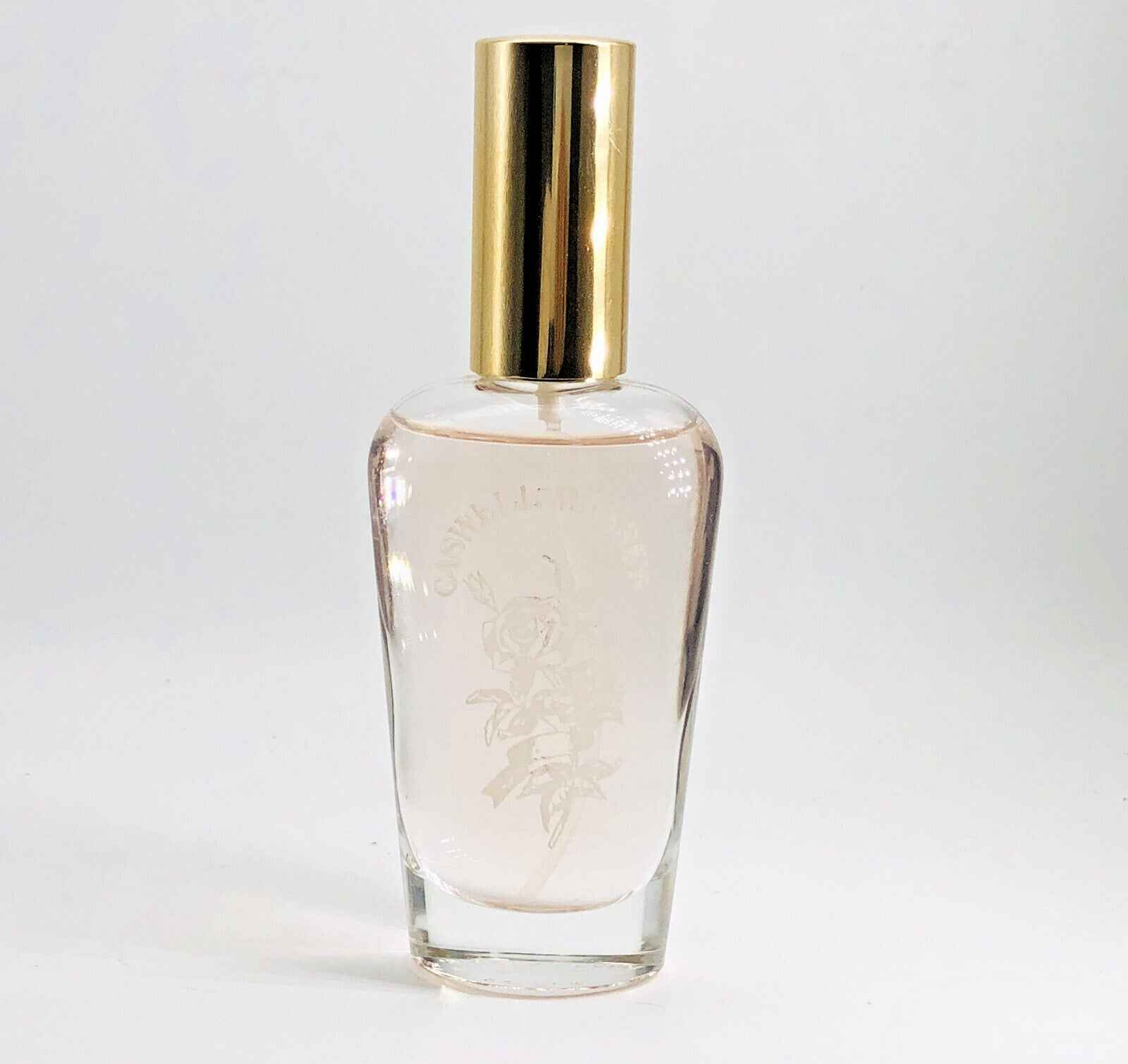 Flacone di profumo Caswell Massey con etichetta elegante e tappo dorato, perfetto per ogni occasione
