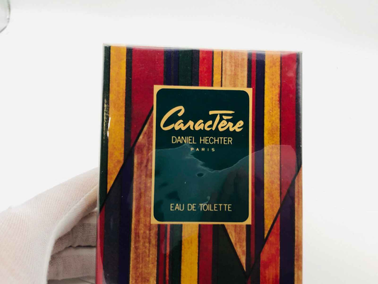 Scatola di profumo Daniel Hechter Caractere Vintage con design a righe colorate per Eau de Toilette