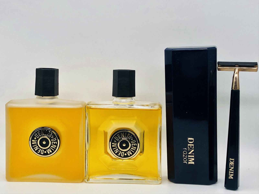 Due flaconi di profumo Denim Original Vintage con eleganti tappi neri e rifiniture dorate