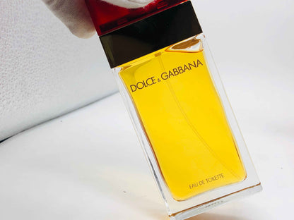 Flacone di Profumo Dolce E Gabbana Classico in vetro trasparente con tappo rosso