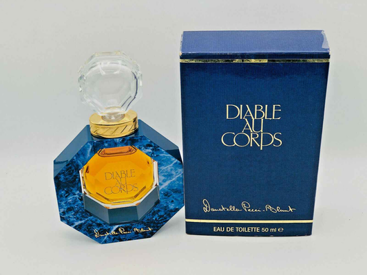 Profumo Vintage Diable Au Cords in bottiglia esagonale con confezione blu elegante da 50 ml