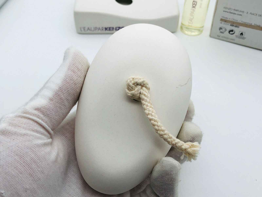L'Eau Par Kenzo Indingo Femme in elegante flacone a forma di sasso con cordino per appenderlo