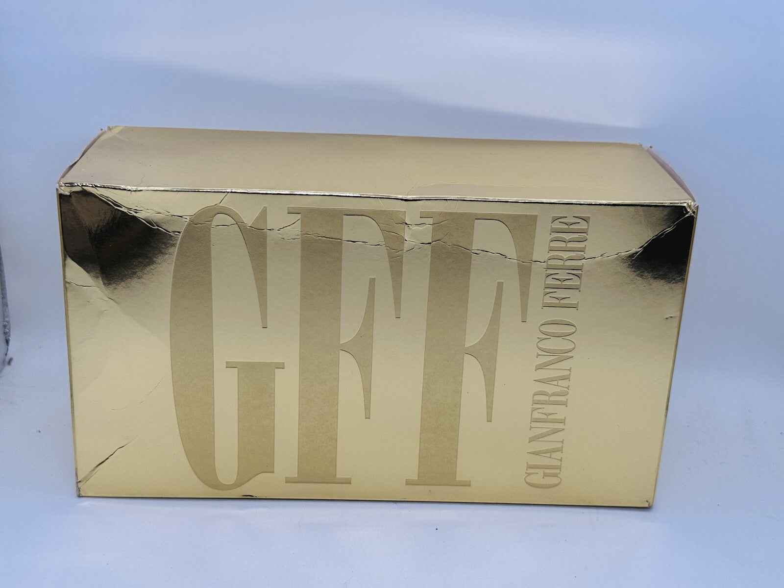 Scatola d'oro di Ferre Gff Profumo Vintage con scritta Gianfranco Ferre elegante e raffinata