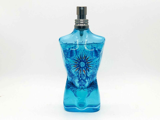 Gaultier Le Male Summer Cologne in a blue bottle shaped like a male torso, ideal for summer freshness