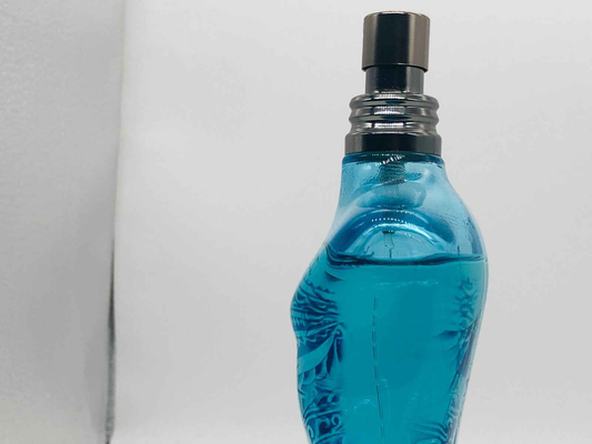 Gaultier Le Male Summer Cologne in a unique blue bottle shaped like a torso