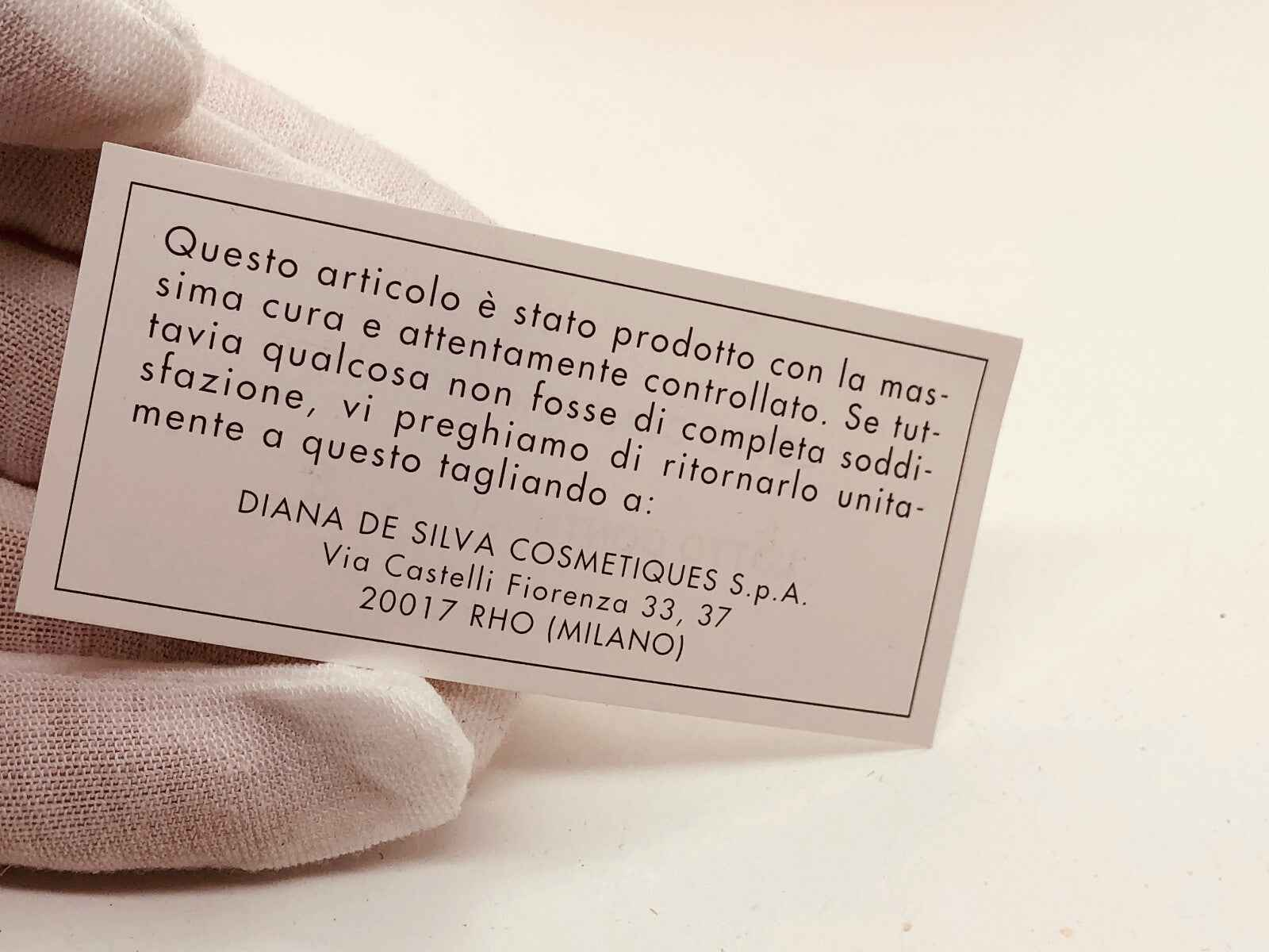 Etichetta del prodotto con dettagli sulla qualità e cura di Gianfranco Ferre Donna Vintage