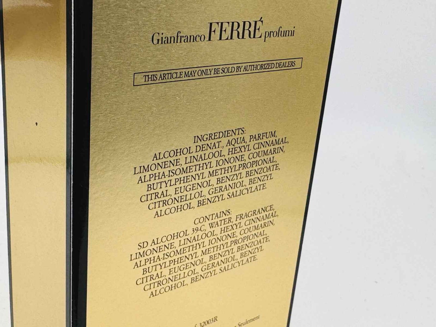 Scatola del profumo Gianfranco Ferre Pour Homme con ingredienti e dettagli sul prodotto in oro