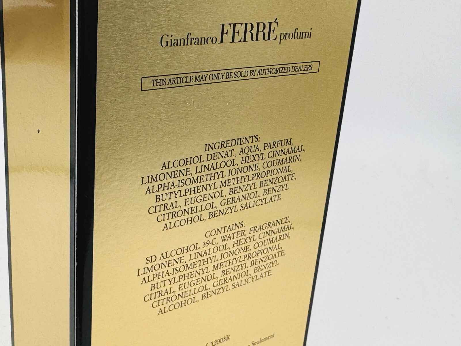 Scatola del profumo Gianfranco Ferre Pour Homme con ingredienti e dettagli sul prodotto in oro