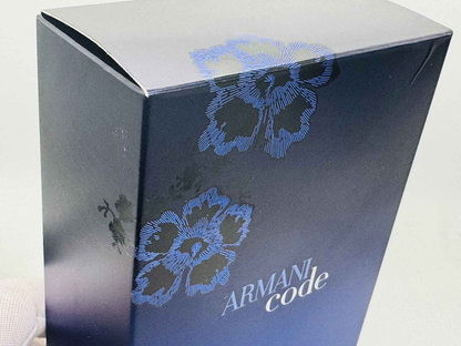 Scatola del profumo Armani Code Elixir con design elegante e floreale in tonalità blu
