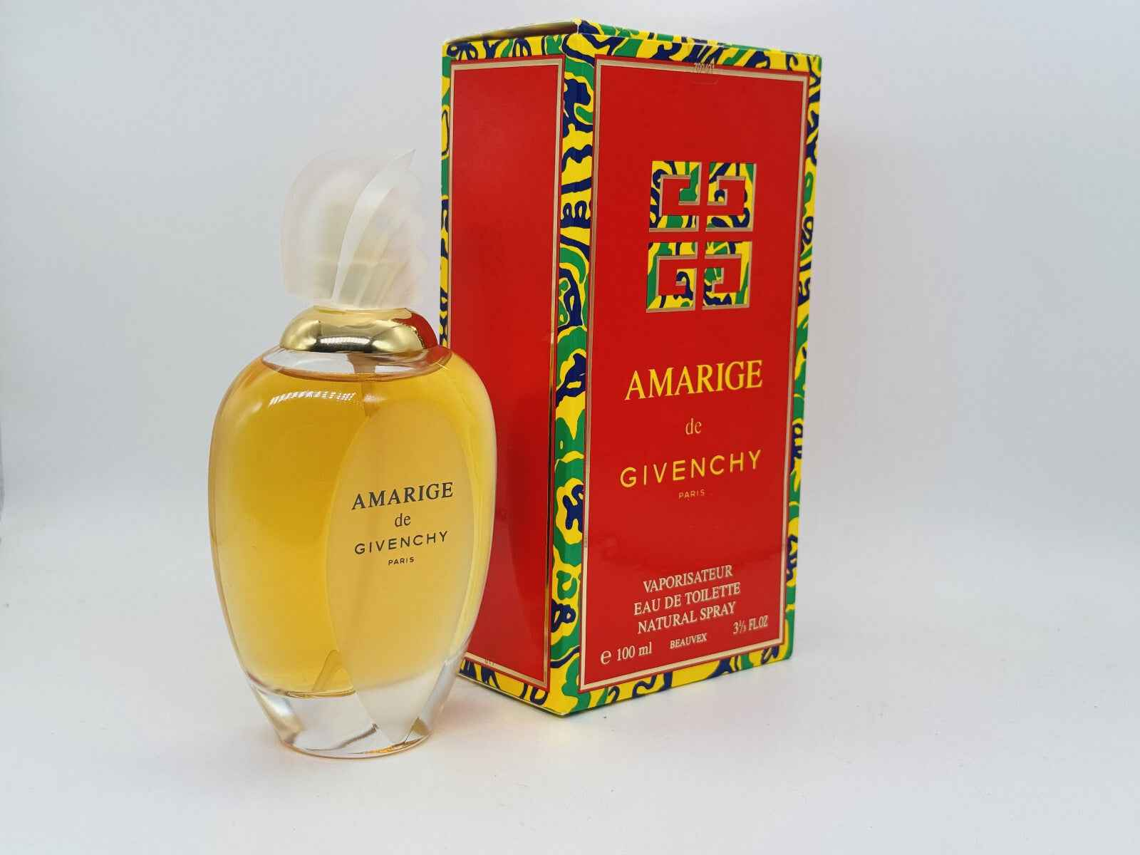 Flacone di profumo Givenchy Amarige Vintage con confezione colorata da 100 ml