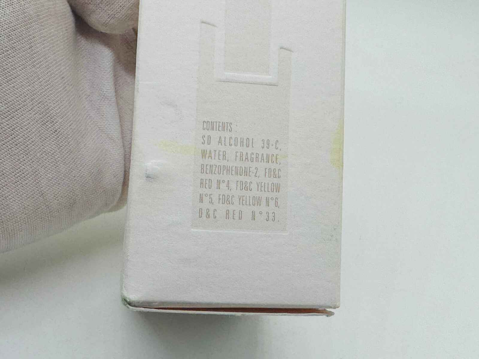 Confezione del profumo Givenchy Pi Greco Vintage con dettagli sugli ingredienti e il design distintivo