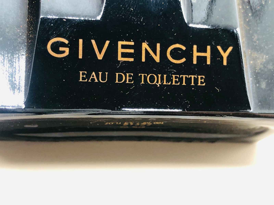 Flacone vintage di profumo Givenchy Xeryus Eau de Toilette con design elegante e dettagli dorati
