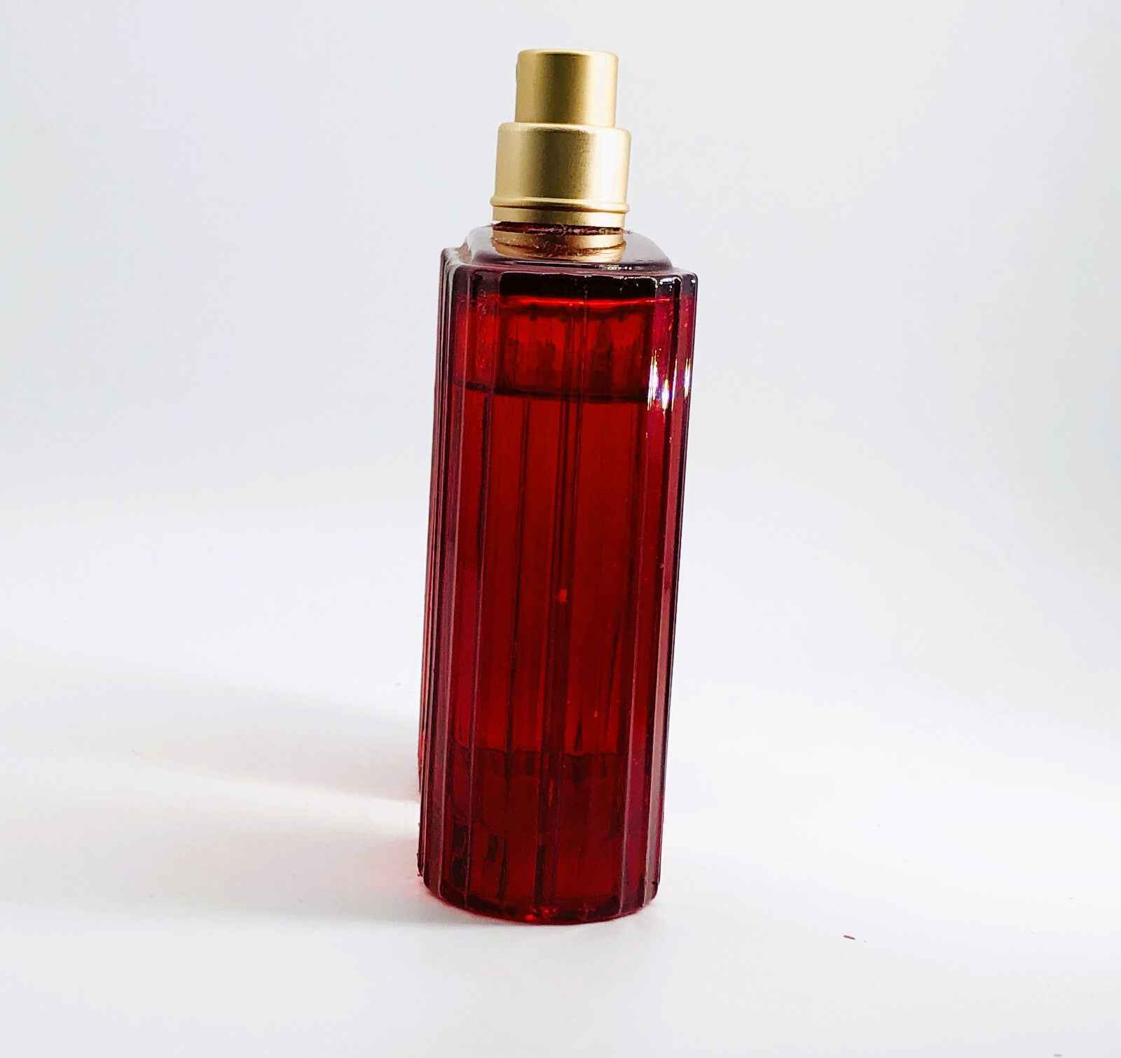 Profumo Vintage Gres Cabaret in flacone rosso con tappo dorato per un tocco elegante