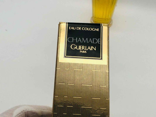 Scatola dorata di Guerlain Chamade Vintage Eau de Cologne con dettagli eleganti