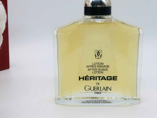 Lozione dopobarba Heritage Guerlain Vintage in bottiglia trasparente per una pelle fresca