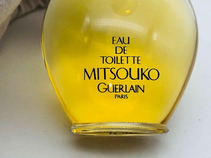 Flacone di Eau de Toilette Guerlain Mitsouko Vintage con etichetta classica e profumo vintage