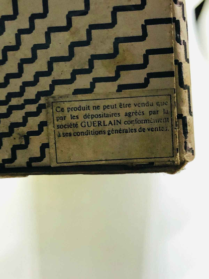Scatola del profumo Guerlain veritable con dettagli eleganti e testo informativo sulla vendita