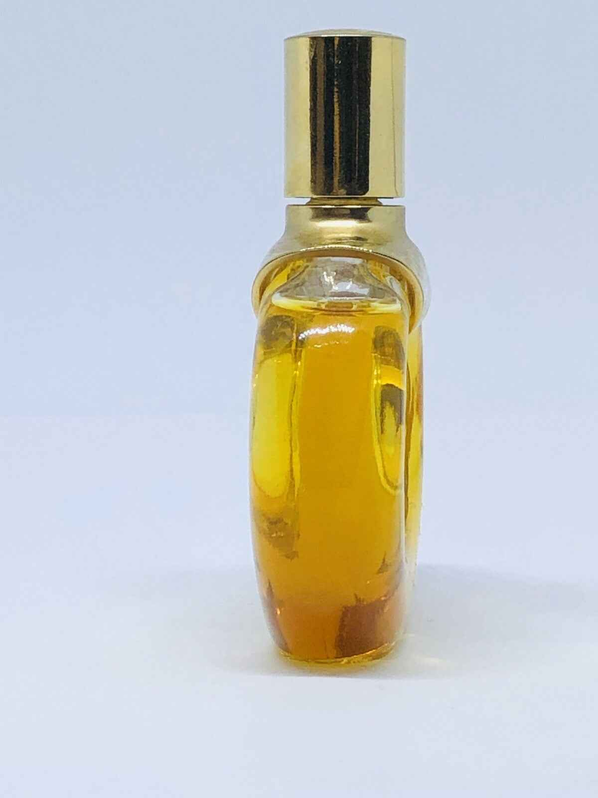 Flacone di Parfum D Hermes Vintage con tappo dorato e profumo ambrato per raffinati intenditori