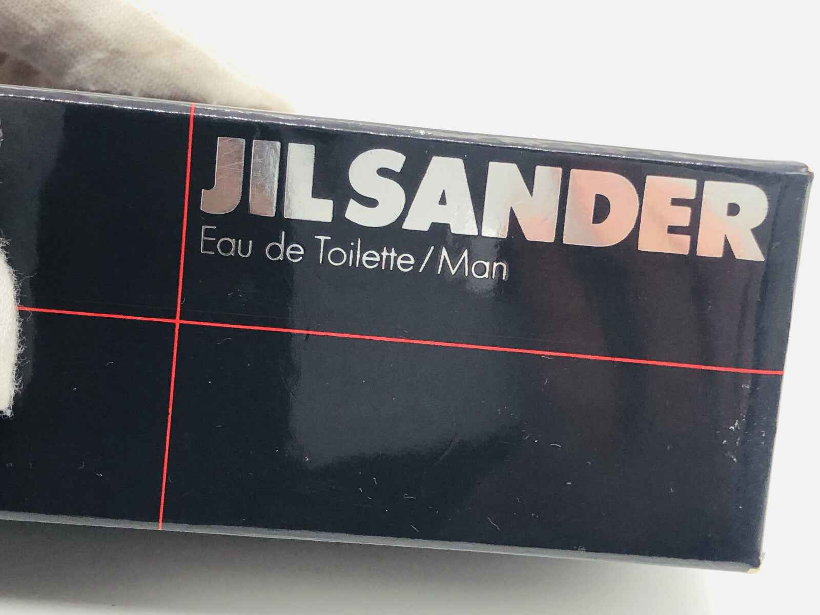 Scatola di profumo Jil Sander Men Pure Eau de Toilette con design elegante e moderno