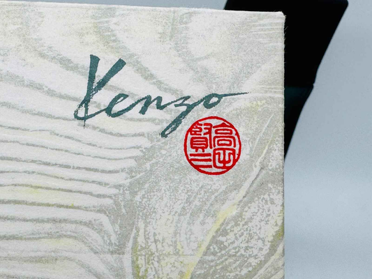 Scatola di Kenzo Pour Homme Vintage con logo e design astratto elegante