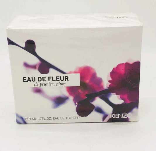 Confezione del profumo Kenzo Vintage Eau de Fleur con fiori di pruno in evidenza