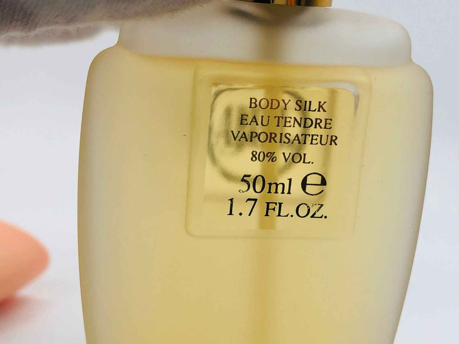Flacone di profumo Body Silk La Perla da 50ml con etichetta elegante e tappo dorato