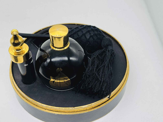 Profumo Lanvin Arpege Vintage in flacone nero con applicatore e pompon nero elegante