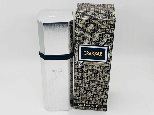 Profumo Laroche Drakkar Vintage in flacone metallizzato con scatola elegante per un look sofisticato