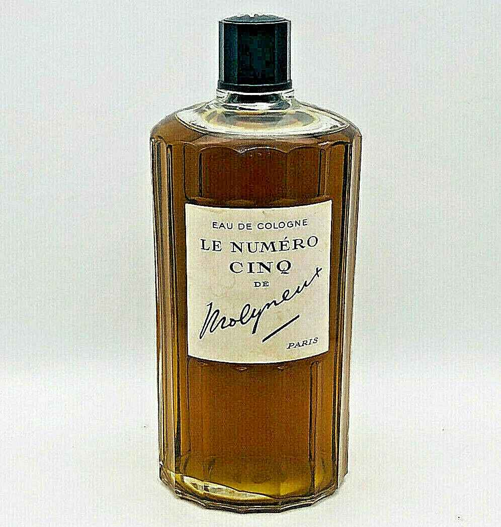 Flacone di Eau de Cologne Le Numero Cinq Molyneux con design elegante e tonalità dorata