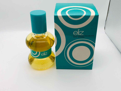 Profumo eliz Borsari Vintage in bottiglia gialla con confezione colorata e moderna