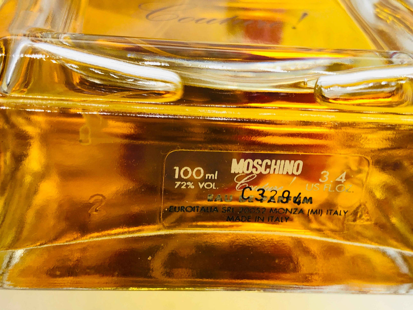 Flacone di profumo Moschino Couture Vintage da 100 ml con etichetta in italiano