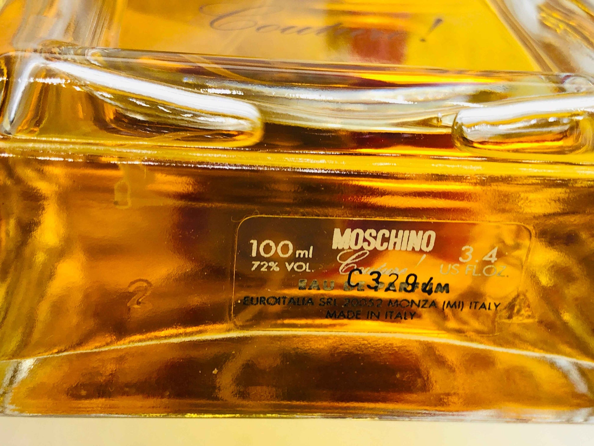 Flacone di profumo Moschino Couture Vintage da 100 ml con etichetta in italiano