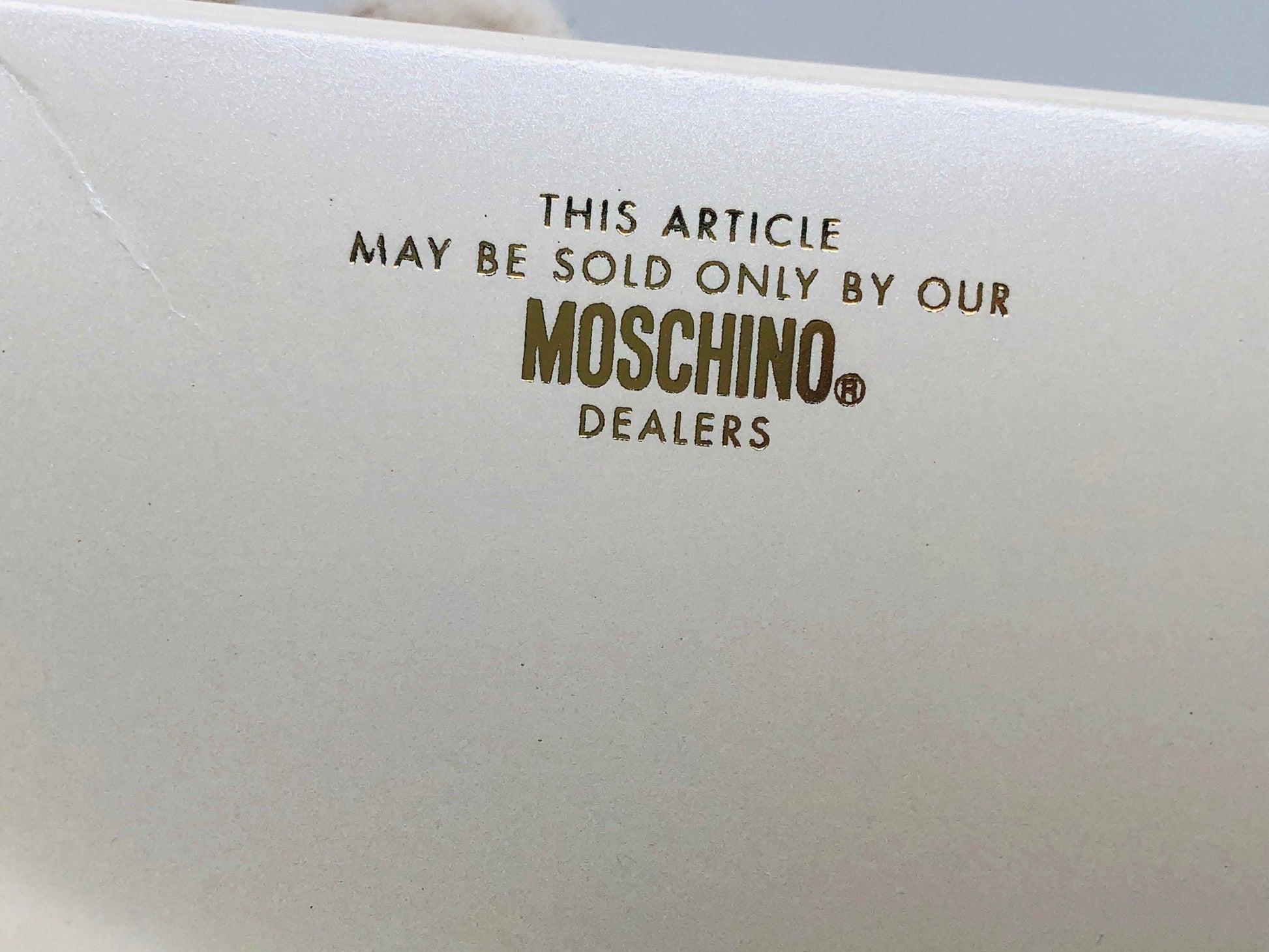 Scatola del profumo Moschino Couture Vintage con etichetta dei rivenditori autorizzati