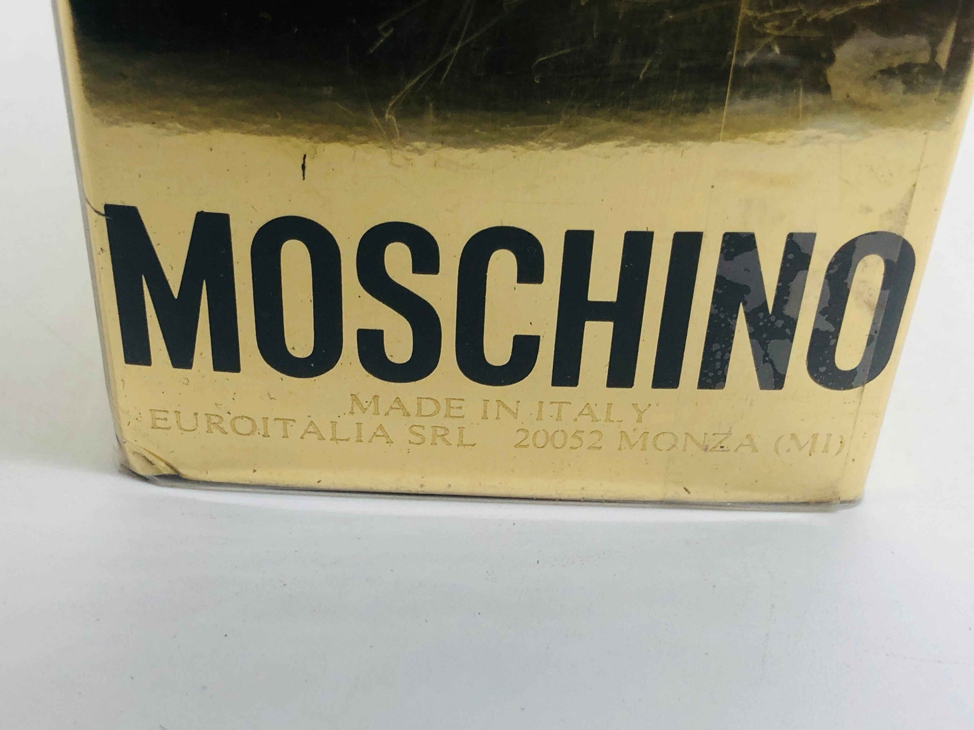 Scatola di profumo Moschino Donna Vintage in oro, elegante e raffinato per appassionati di fragranze