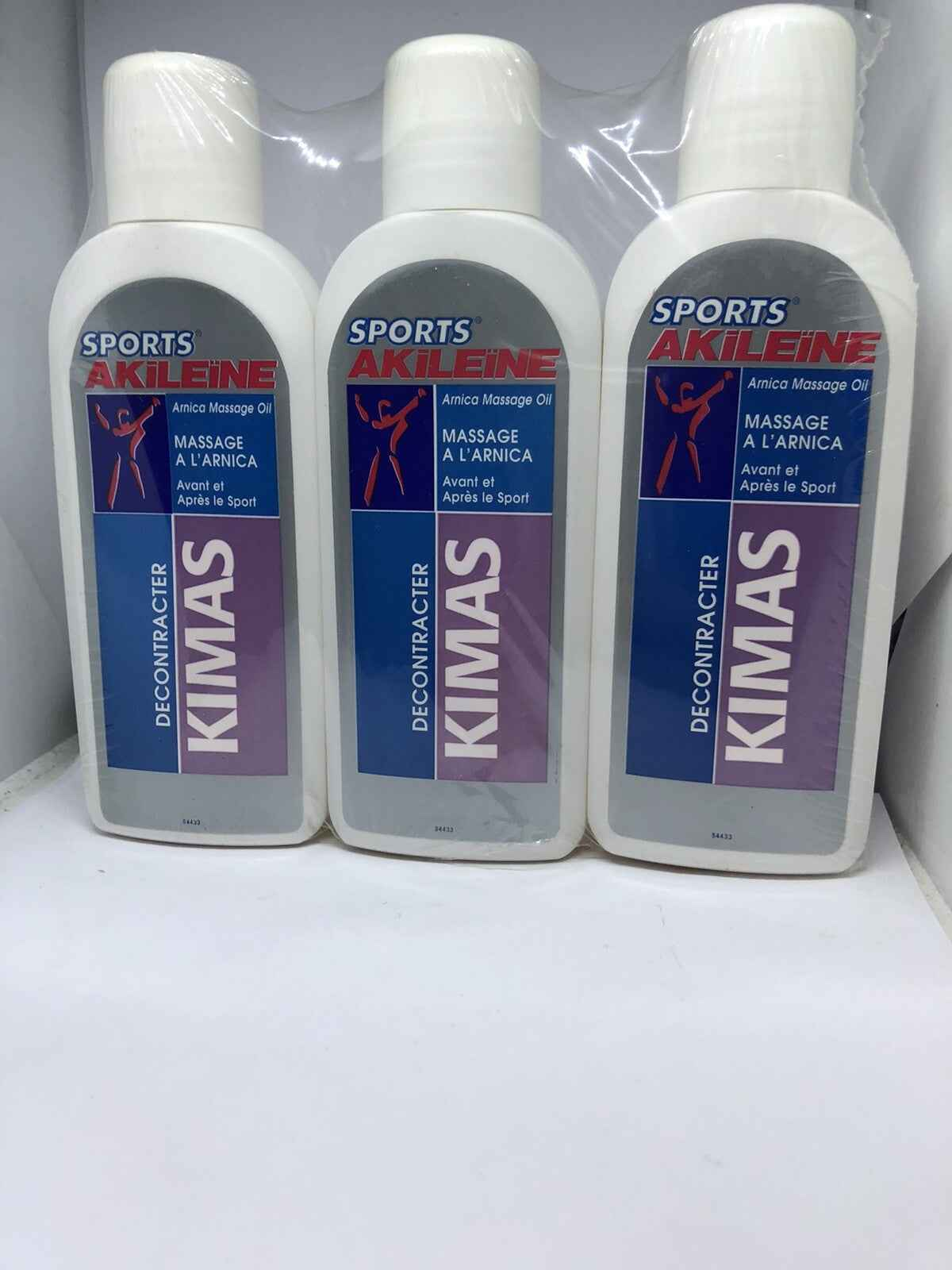 Tre flaconi di Olio Arnica Akileine Kimas per massaggio sportivo, ideale per il recupero muscolare
