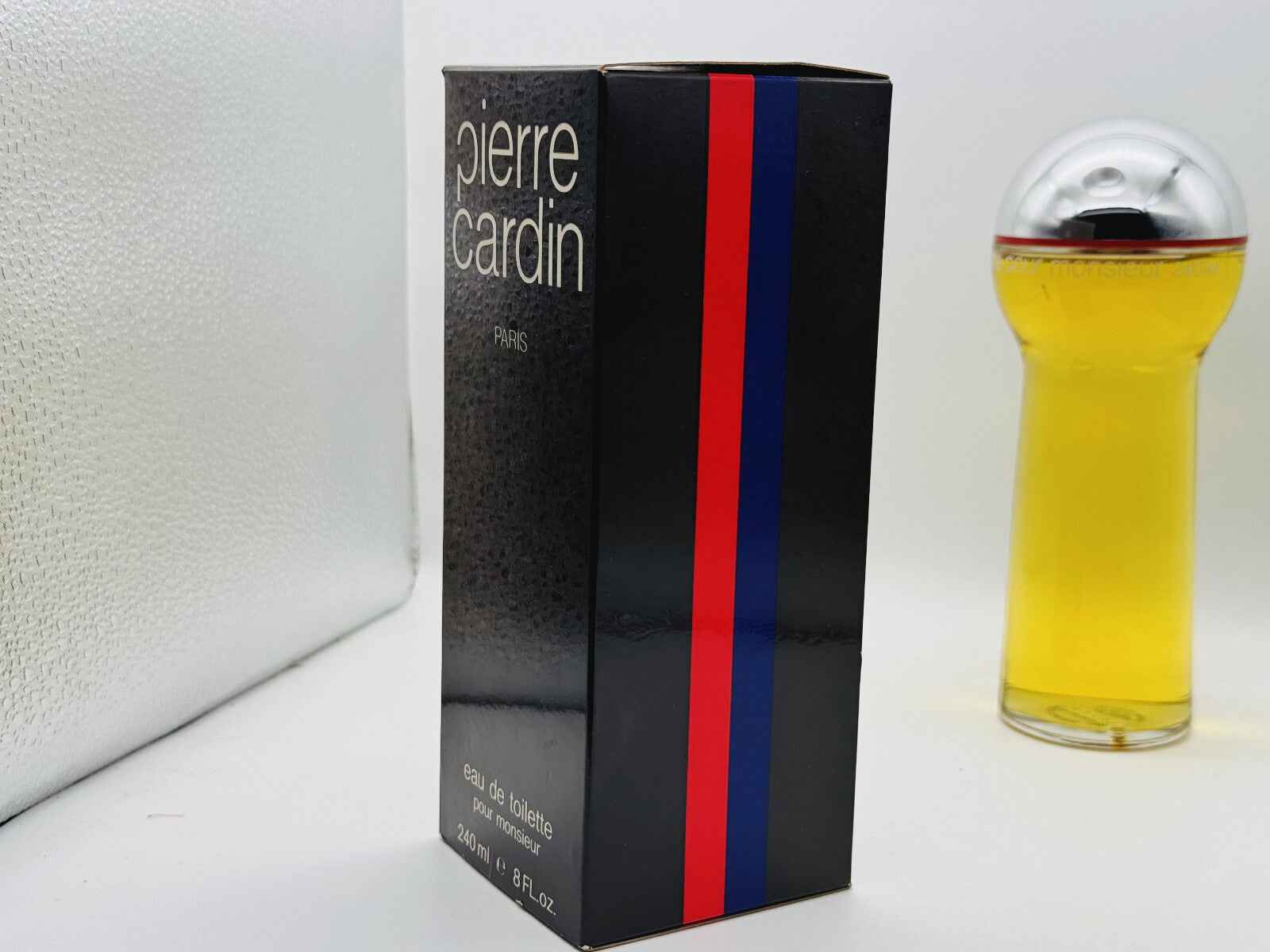 Profumo Pierre Cardin Pour Monsieur in elegante confezione nera con strisce colorate