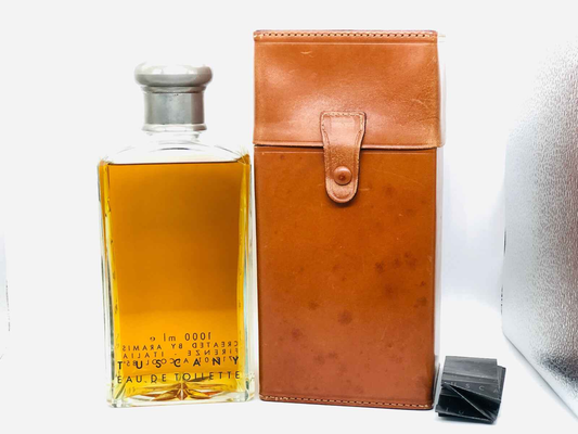 Profumo Aramis Tuscany Vintage in bottiglia di vetro con astuccio in pelle per un tocco elegante