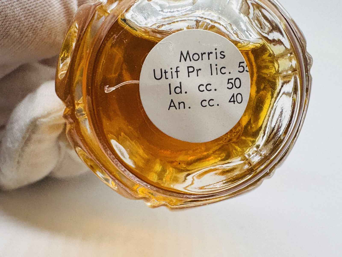 Bottiglia di profumo Morris Desiree Napoleon Vintage con etichetta chiara sul fondo