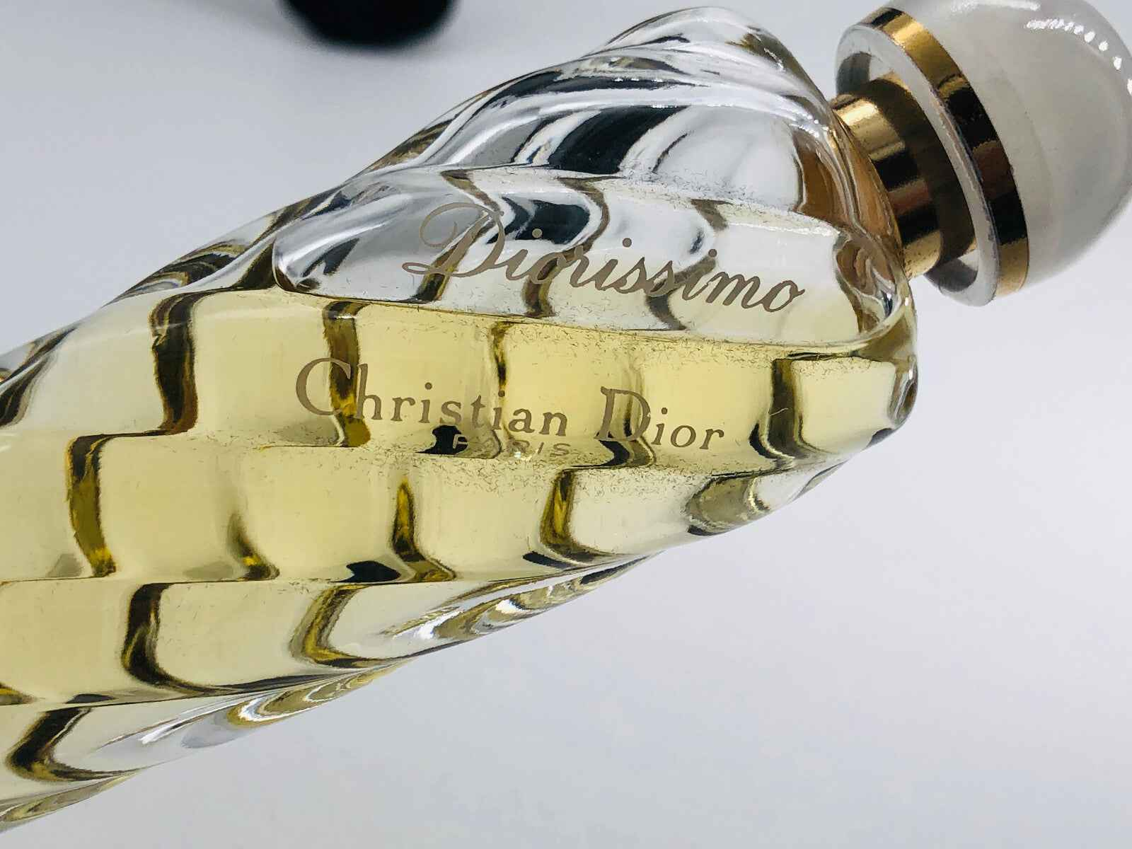 Flacone di Profumo Dior Diorissimo Vintage con design elegante e fragranza classica